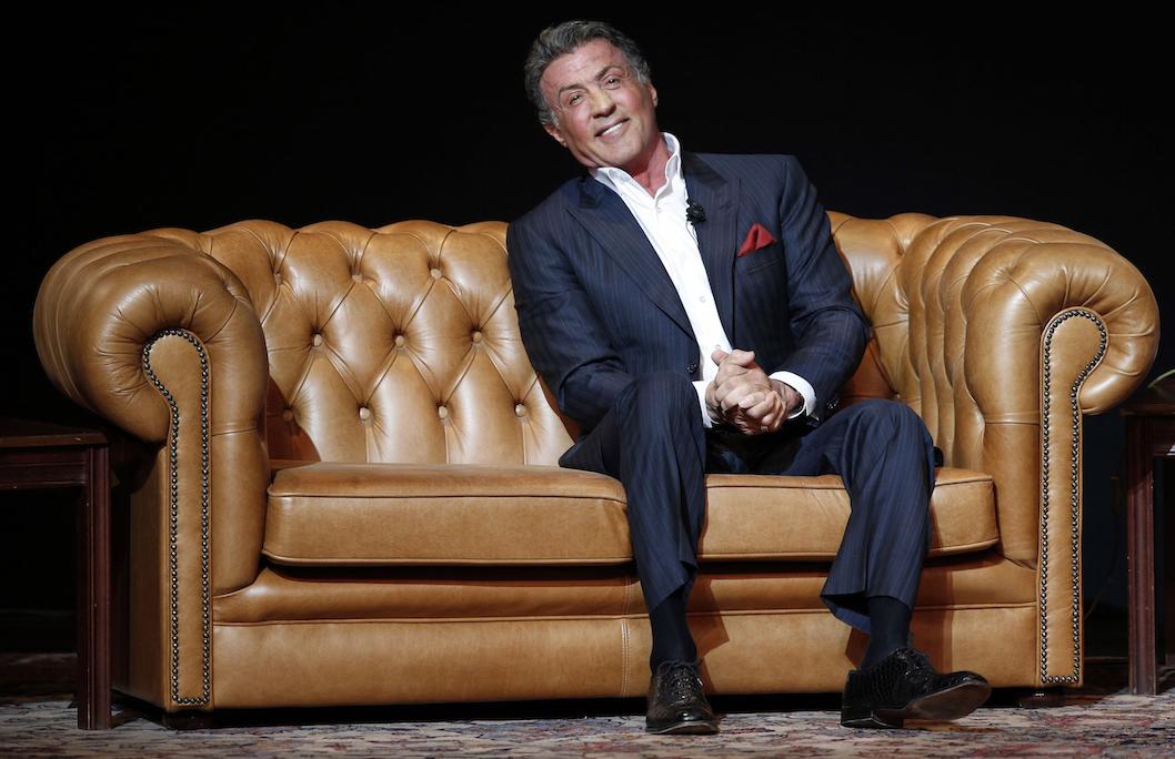 Sylvester Stallone seated on stage during An Evening with Sylvester Stallone.