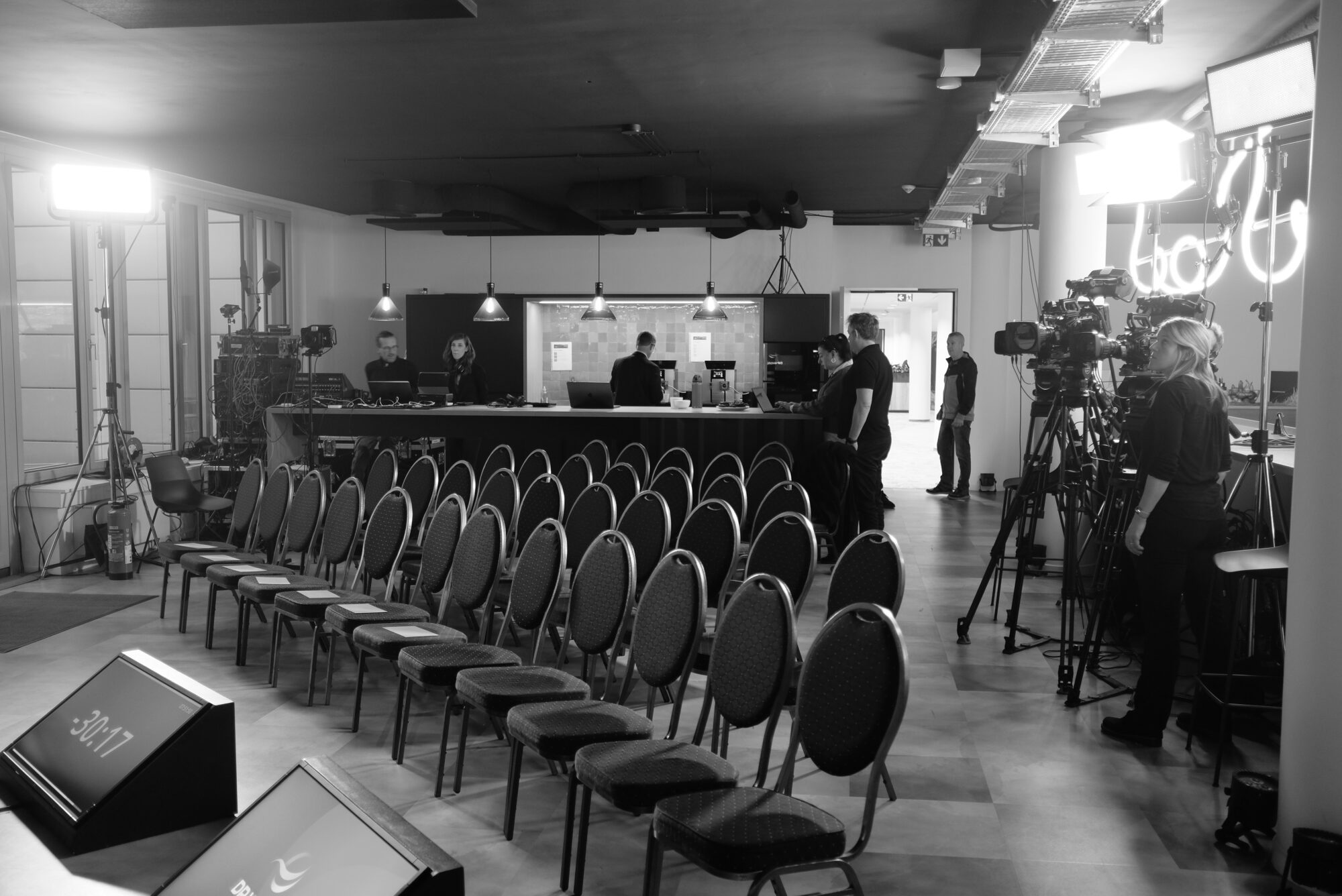 Stage and lectern ready for a corporate event broadcast