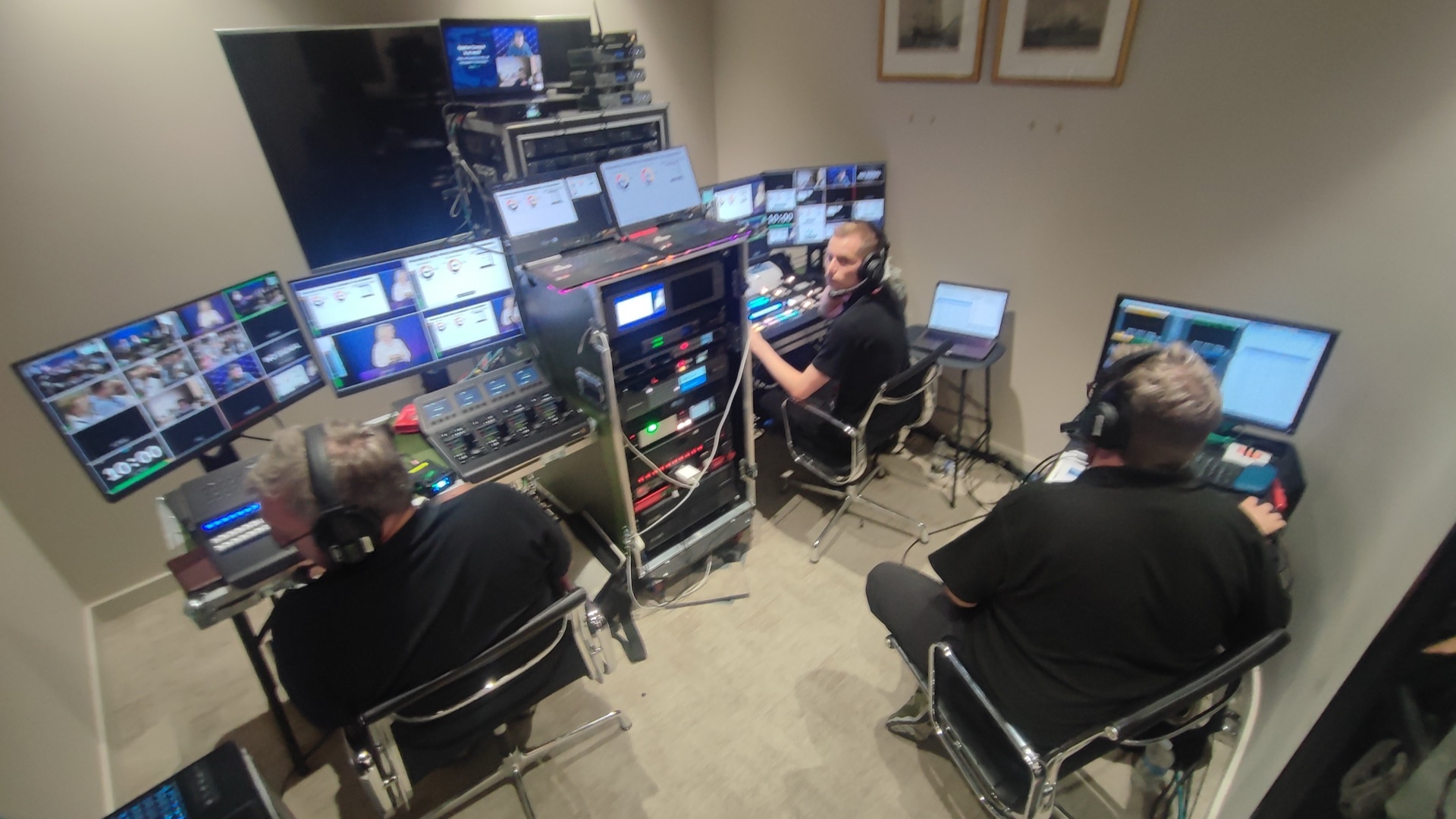 Production gallery switching cameras, graphics and remote inputs for the DP World townhall.