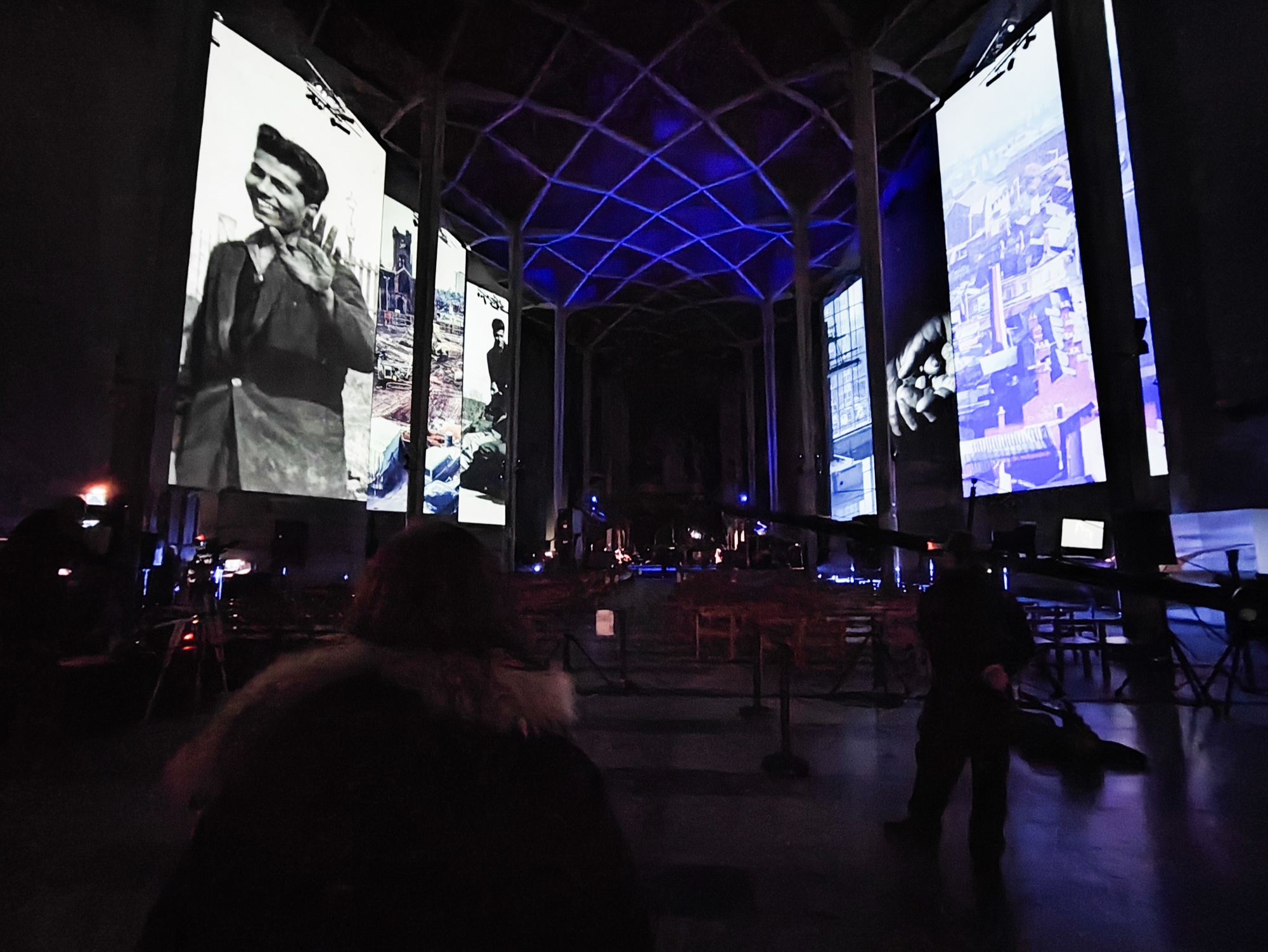 Projected archive imagery inside Coventry Cathedral during Ghosts in the Ruins