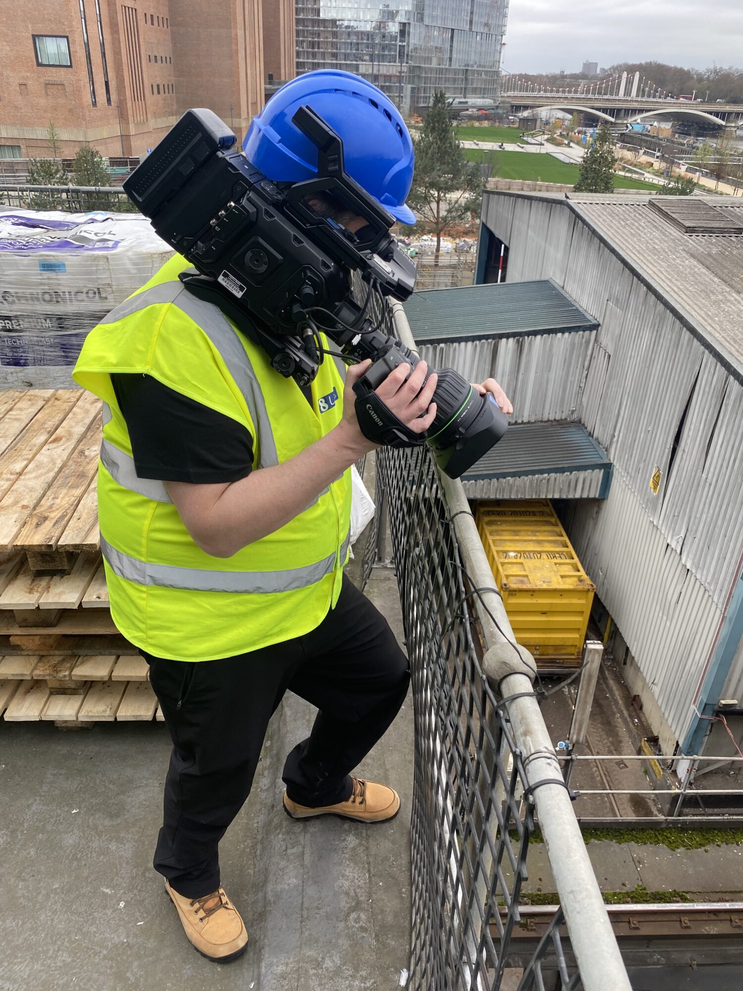 Camera operator filming the Intelex and Cory customer story at Cringle Dock beside the River Thames