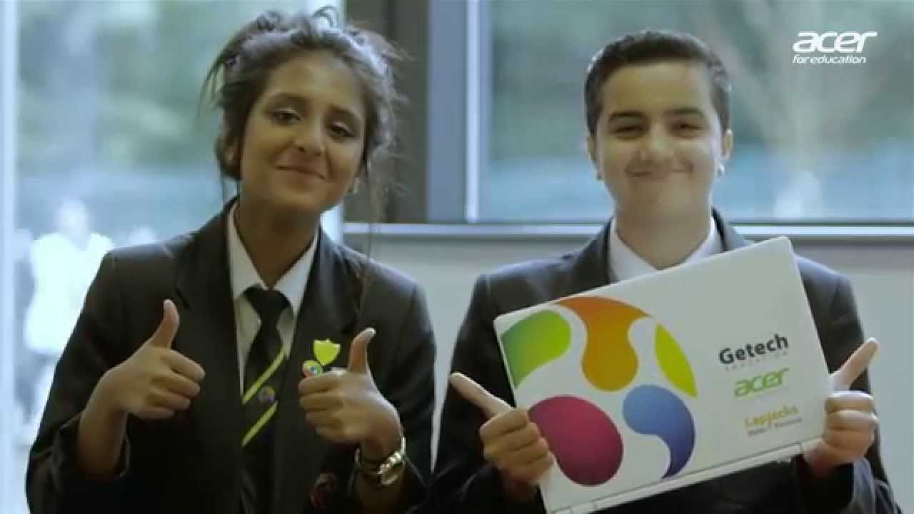 University Academy Keighley students holding an Acer Chromebook during the case study film