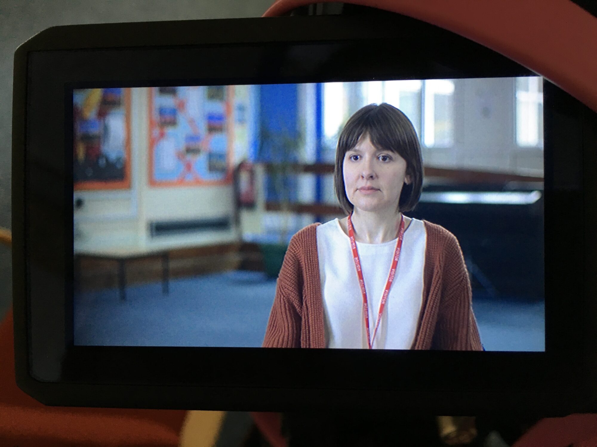 Teacher interview framed on a production monitor during the LEGO Education StoryStarter education film