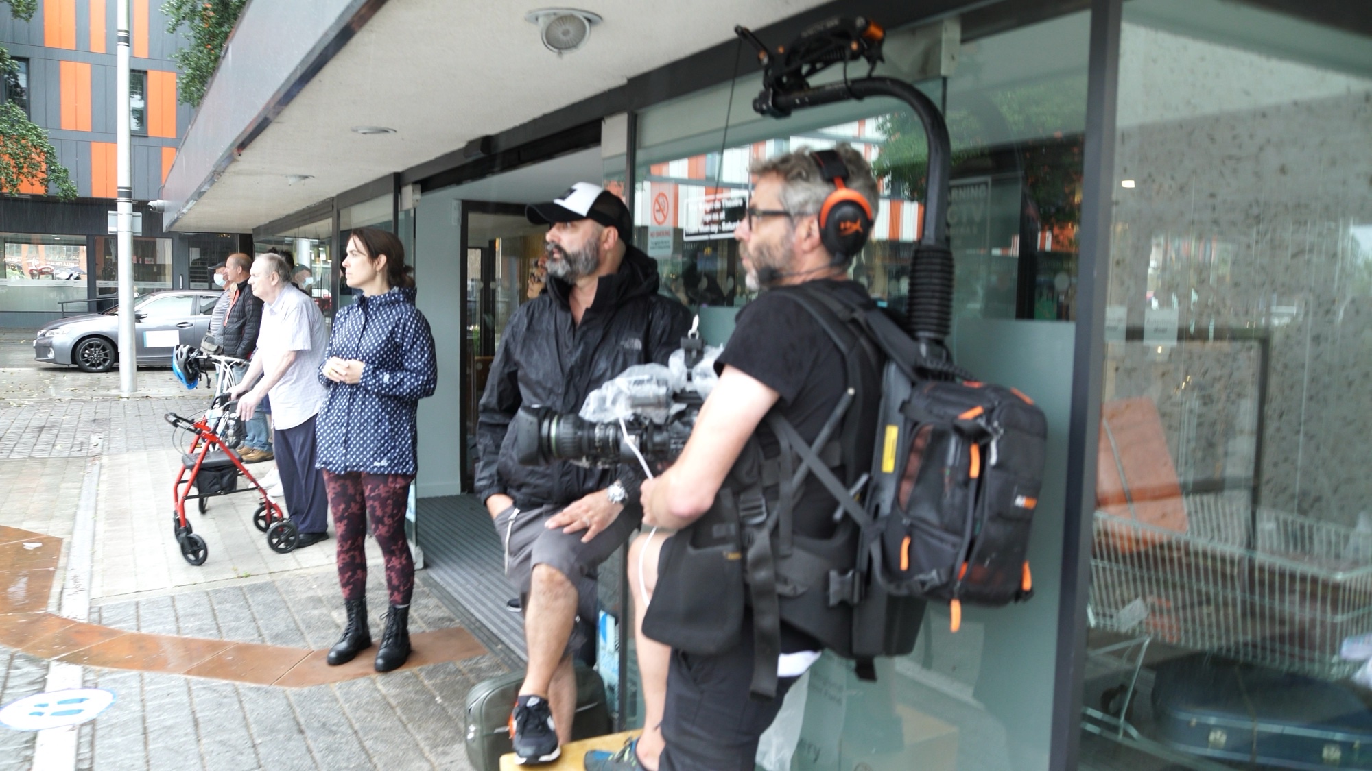 Camera operator wearing an Easyrig and remote transmission backpack during RSC Faith.