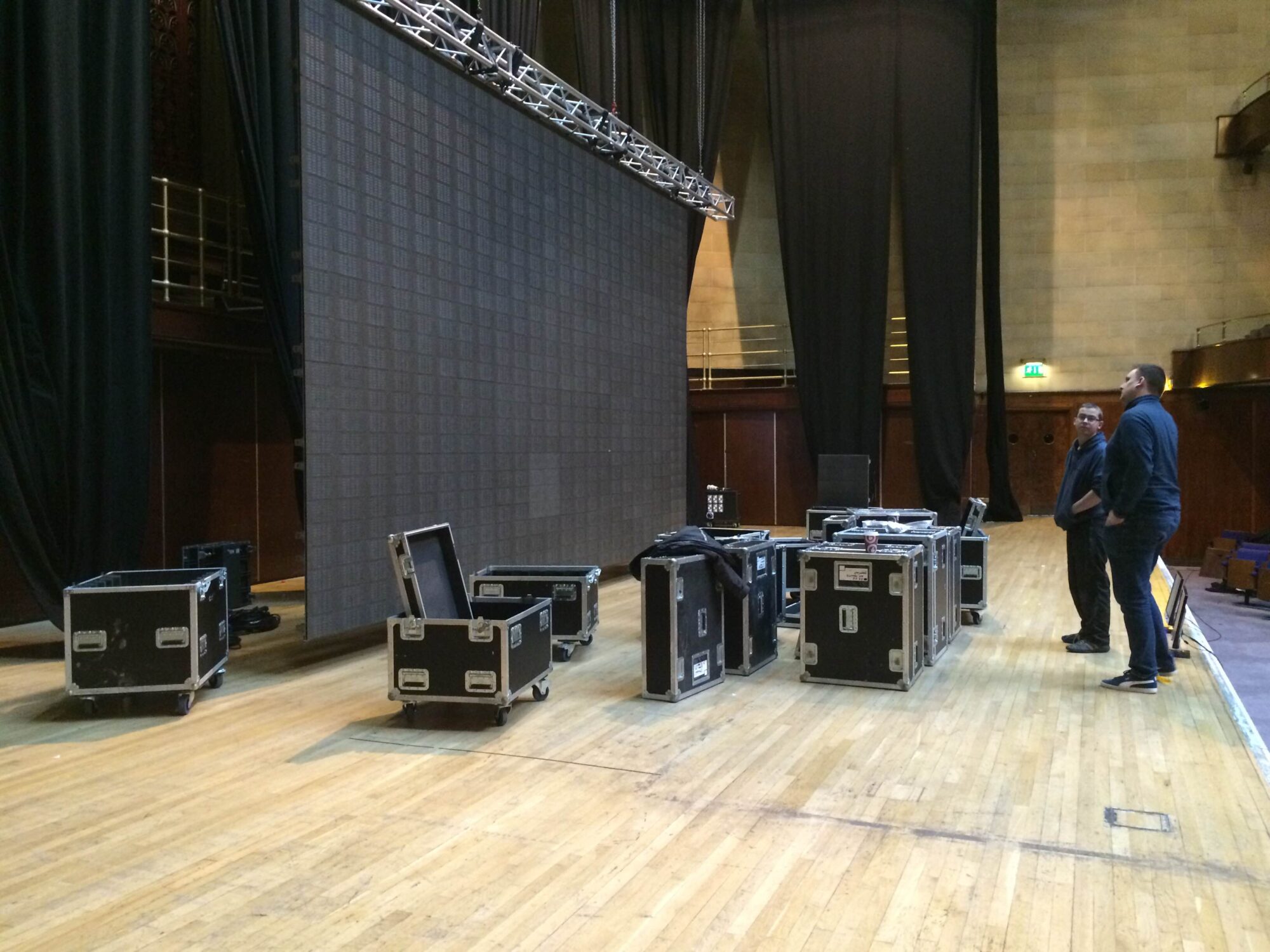The 42-foot modular LED screen and flight cases during setup for An Evening with Sylvester Stallone at Sheffield City Hall.